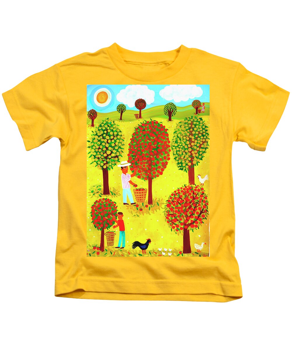 Abundance Kids T-Shirt featuring the photograph Family Picking Apples In Orchard by Ikon Ikon Images