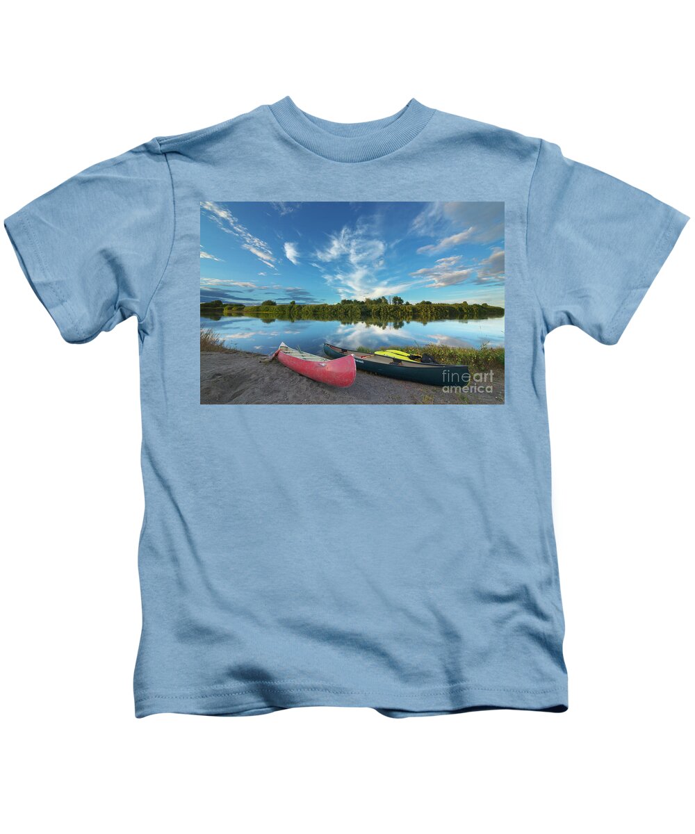 00559205 Kids T-Shirt featuring the photograph Canoes With Clouds Reflecting by Yva Momatiuk John Eastcott