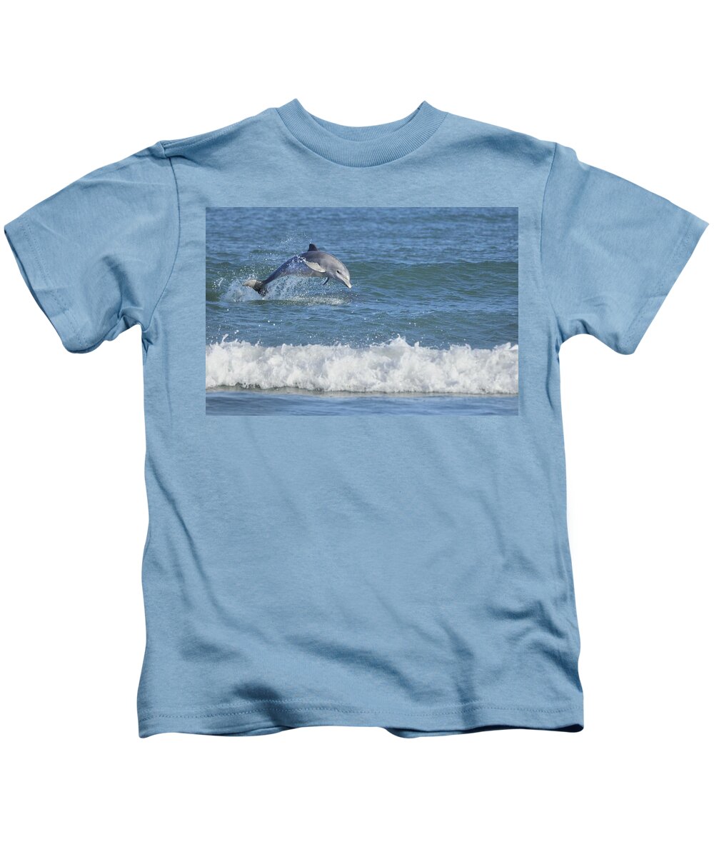 Dolphin Kids T-Shirt featuring the photograph Dolphin in surf by Bradford Martin