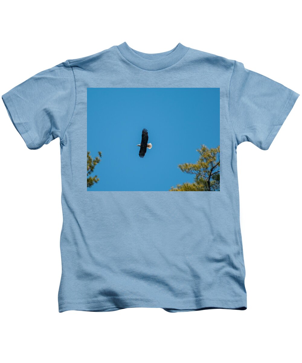 Bald Eagle Kids T-Shirt featuring the photograph In Flight by Brenda Jacobs