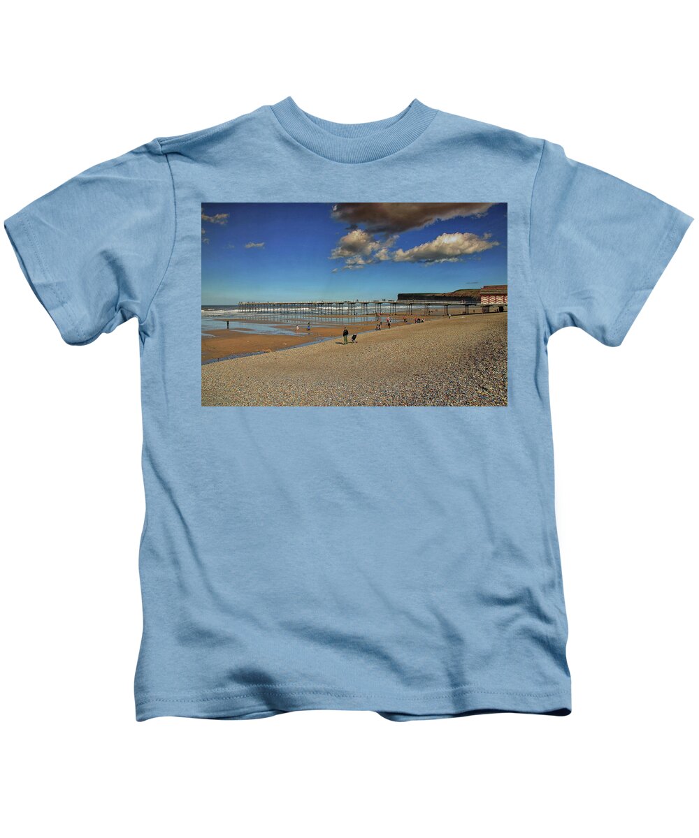 Seaside Kids T-Shirt featuring the photograph A Day At The Seaside #1 by Jeff Townsend