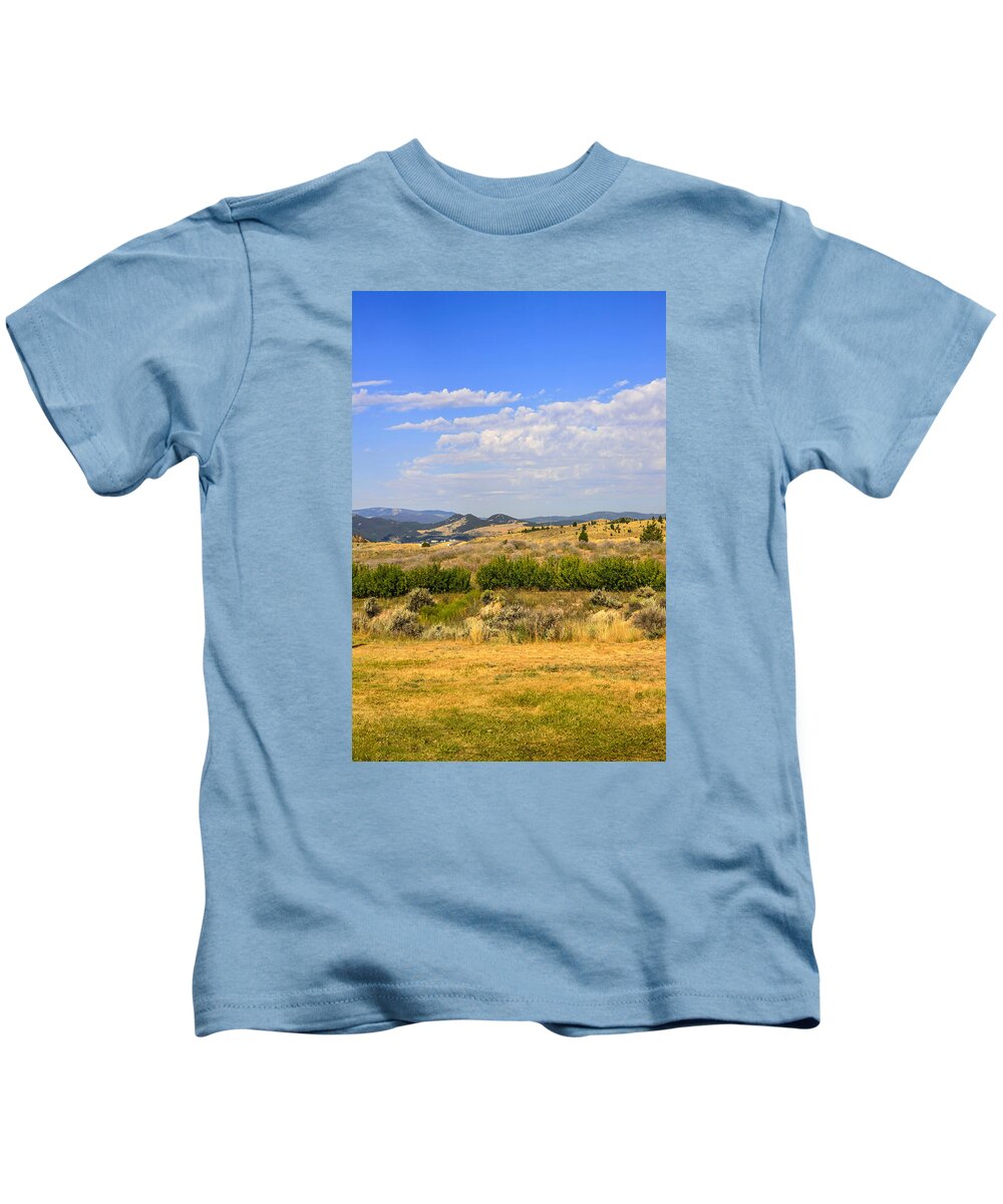 Montana; Plains; Big; Sky; Country; Mt; America; Usa; North-west; State; Scenery; Backdrop; Landscape; Setting; Spectacle; Vista; View; Panorama; Scene; Setting; Terrain; Location; Outlook; Sight; Flora; Clouds; Sagebrush Kids T-Shirt featuring the photograph Big Sky Montana #2 by Chris Smith