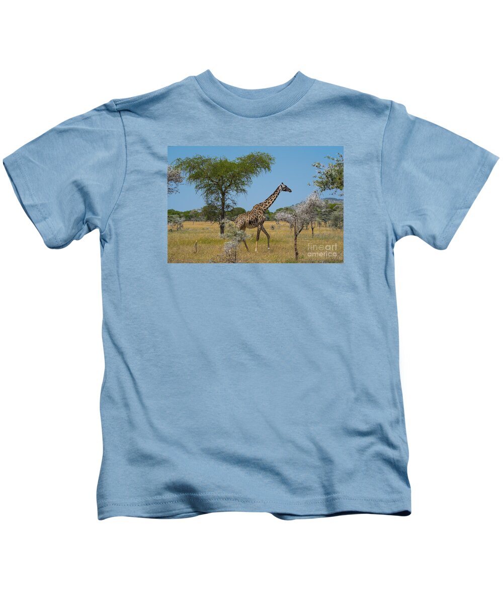Giraffe Kids T-Shirt featuring the photograph Giraffe on the move by Pravine Chester