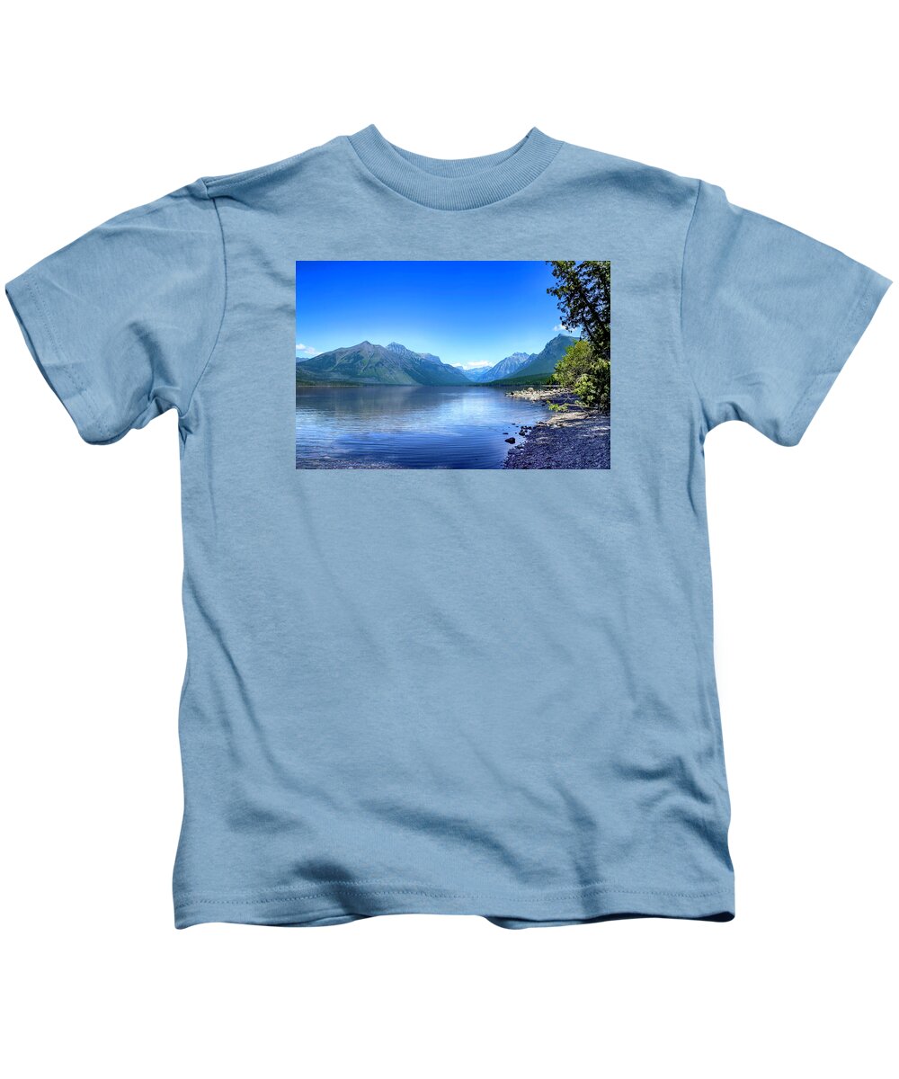 Lake Mcdonald Kids T-Shirt featuring the photograph Lake McDonald by Lorraine Baum