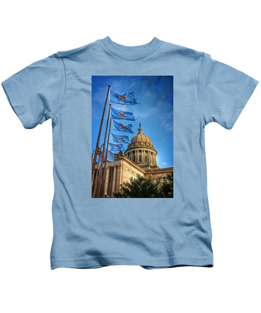 Oklahoma Kids T-Shirt featuring the photograph Oklahoma Capitol Flags and Wind by Buck Buchanan