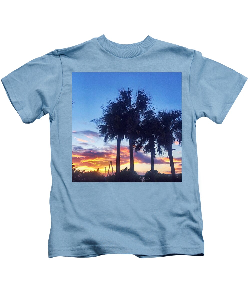Southern_sights Kids T-Shirt featuring the photograph Sometimes The Sky Catches Fire And You by Cassandra M Photographer
