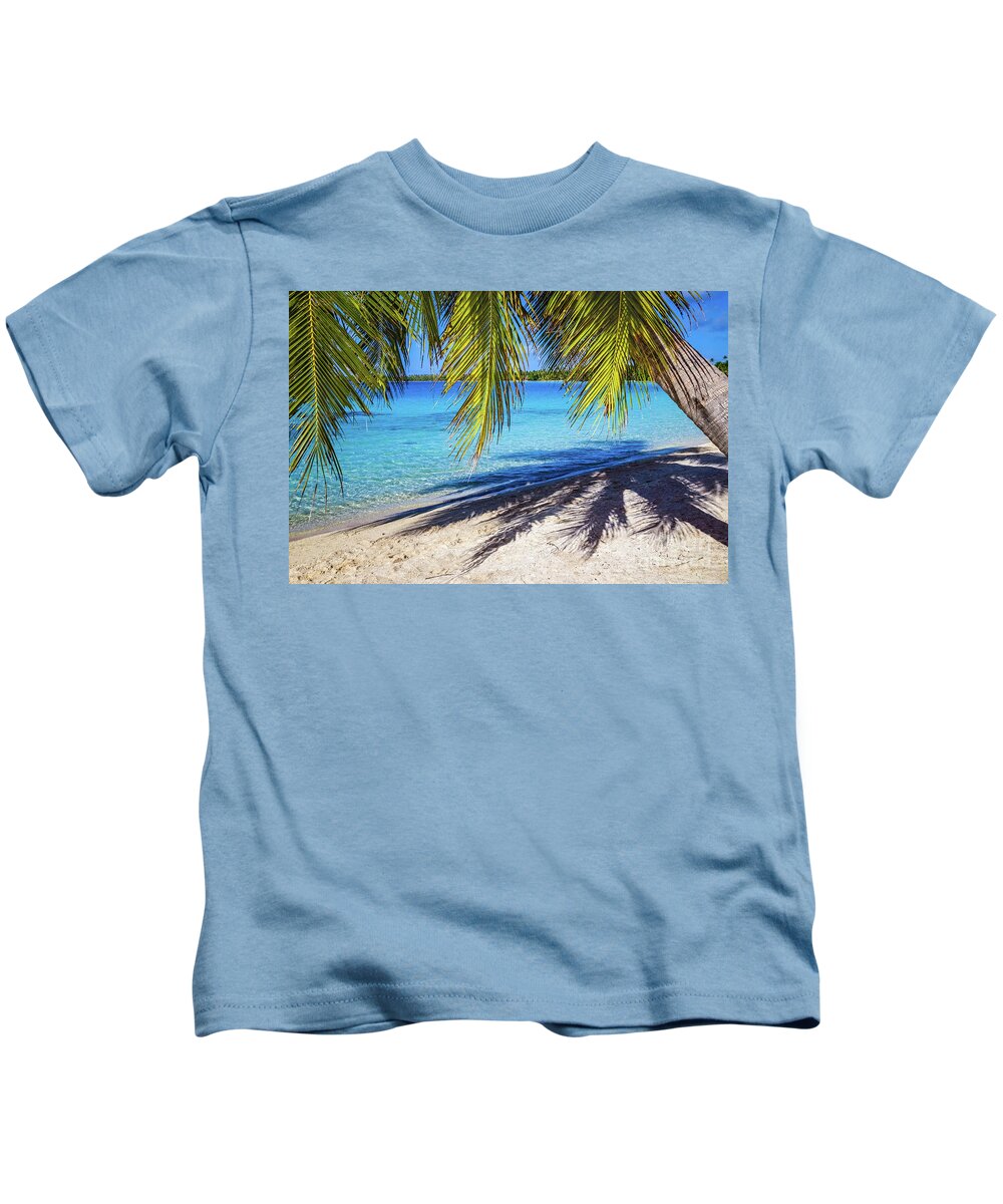 Palm Kids T-Shirt featuring the photograph Shadows on the beach, Takapoto, Tuamotu, French Polynesia by Lyl Dil Creations
