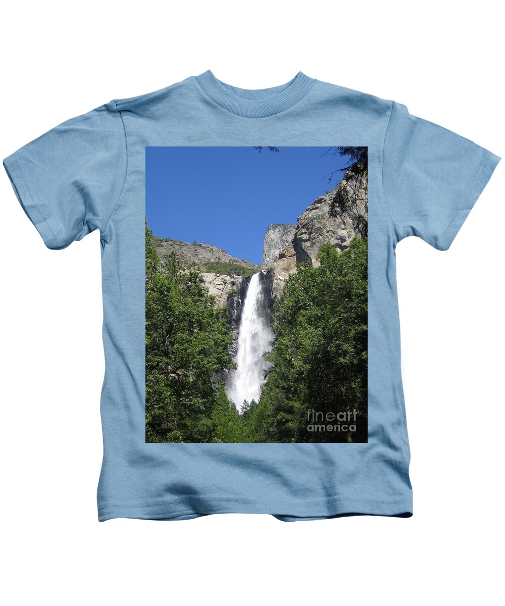 Yosemite Kids T-Shirt featuring the photograph Yosemite National Park Bridal Veil Falls Water Fall Blast on a Blue Sky Day by John Shiron