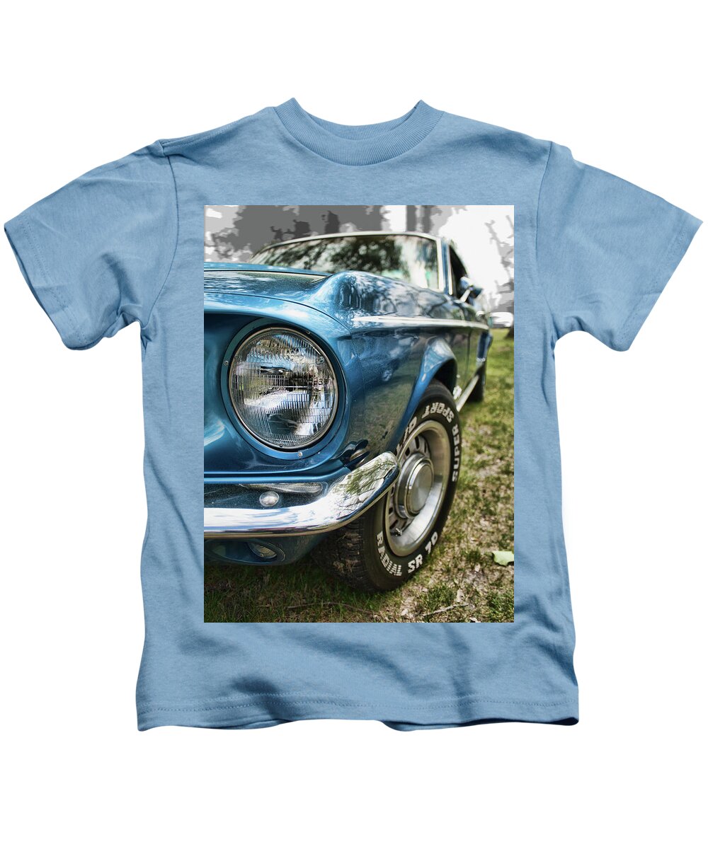 Car Kids T-Shirt featuring the photograph '65 Ford Mustang front #65 by Daniel Adams