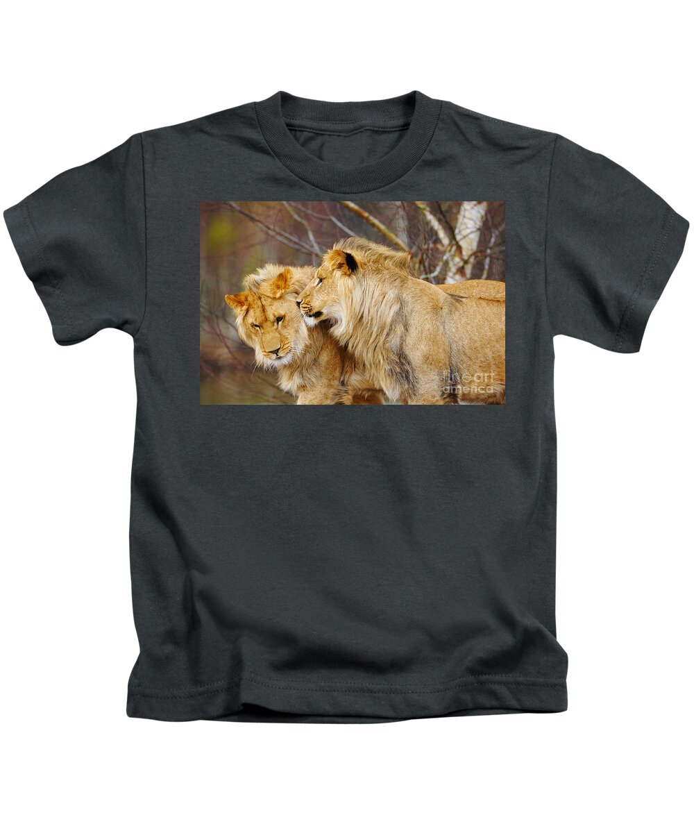 Closeup Kids T-Shirt featuring the photograph Two lions close together #4 by Nick Biemans