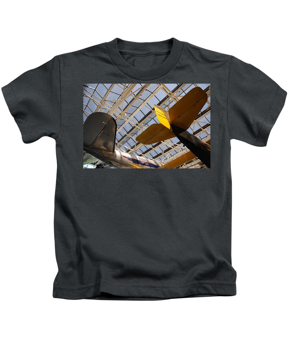 Planes Kids T-Shirt featuring the photograph Airplane Rudders by Kenny Glover