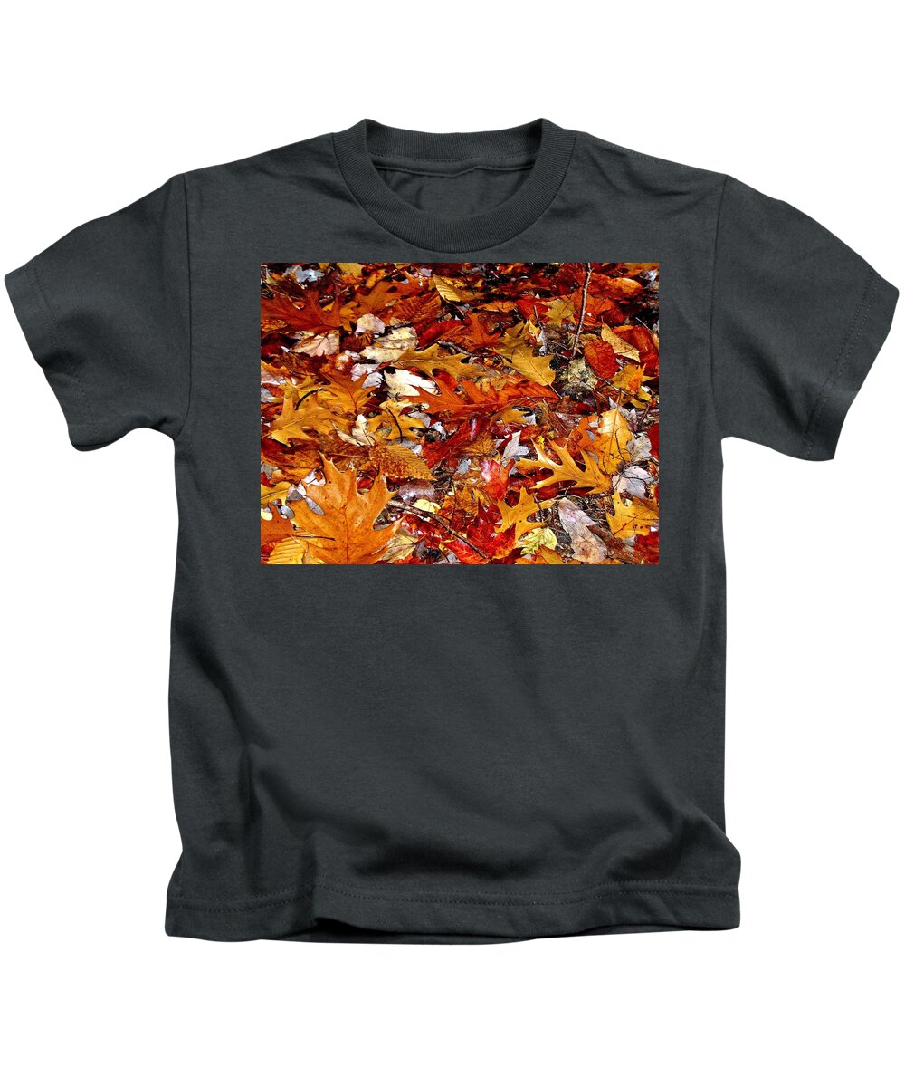 Autumn Kids T-Shirt featuring the photograph Autumn Leaves on the Ground in New Hampshire - Bright Colors by Phyllis Meinke