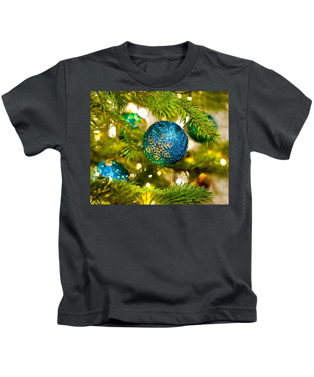 Advent Decoration Kids T-Shirt featuring the photograph Bauble in a Christmas tree by U Schade