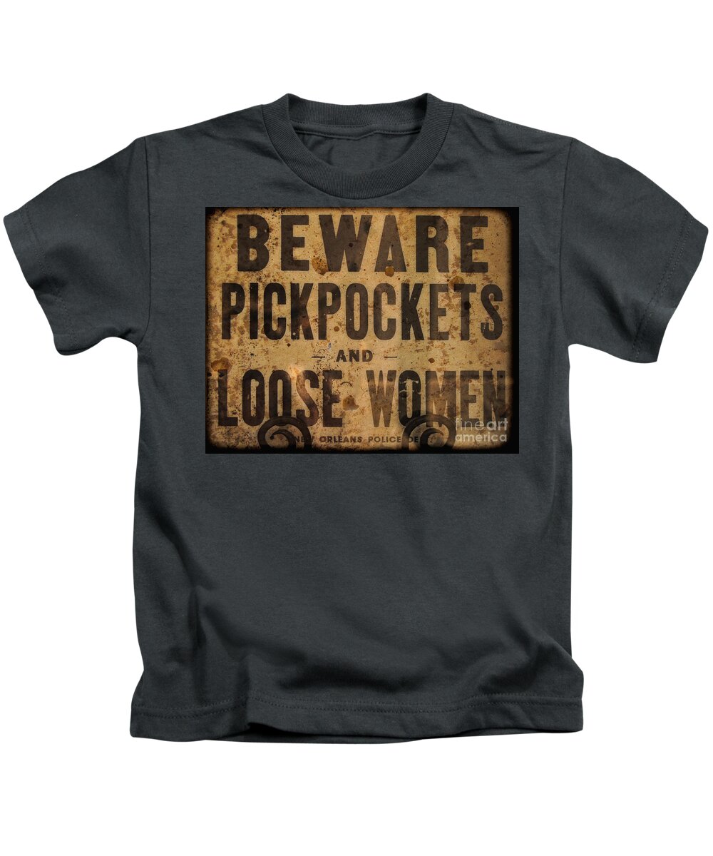 Sign Kids T-Shirt featuring the photograph Beware Pickpockets and Loose Women by Kathleen K Parker