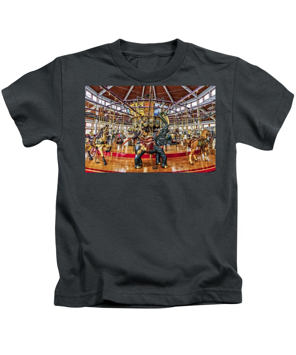 Carousel Kids T-Shirt featuring the photograph Carousel by Brett Engle