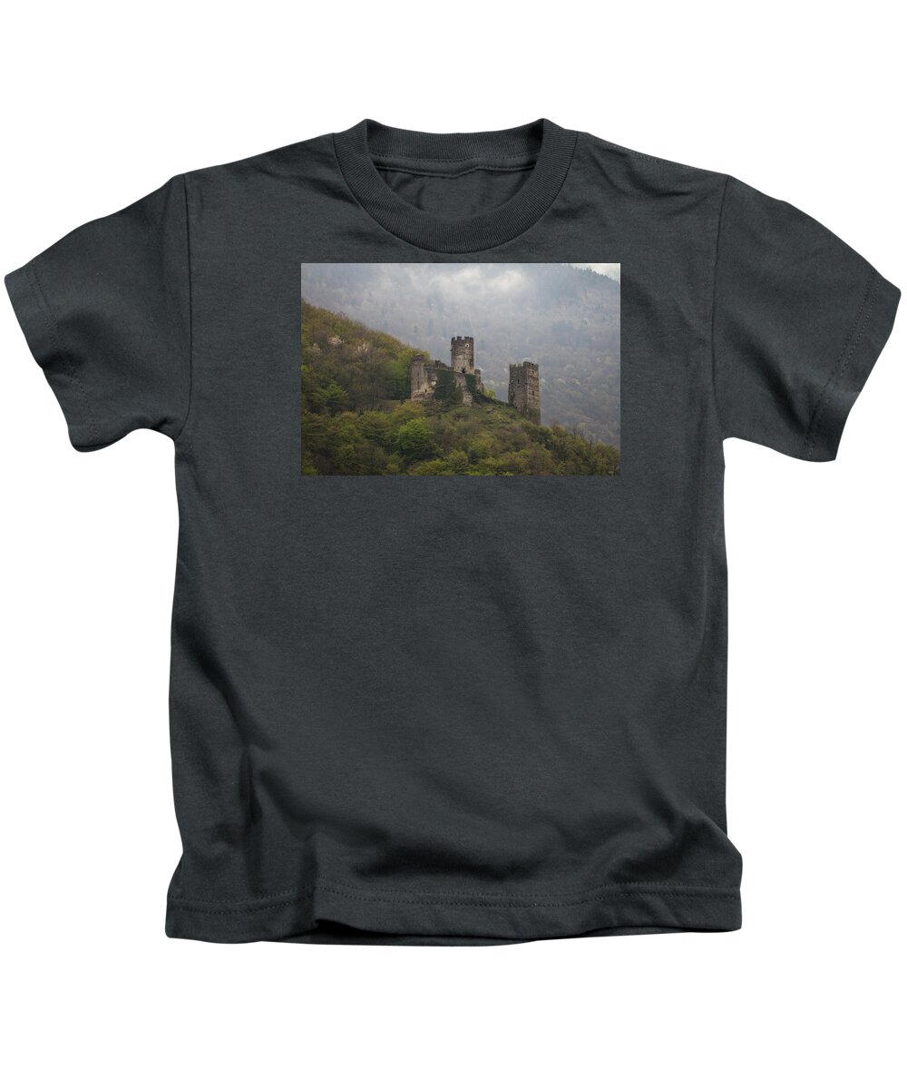 Clare Bambers Kids T-Shirt featuring the photograph Castle in the Mountains. by Clare Bambers