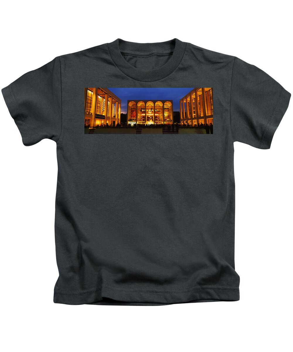 Photography Kids T-Shirt featuring the photograph Entertainment Building Lit Up At Night by Panoramic Images