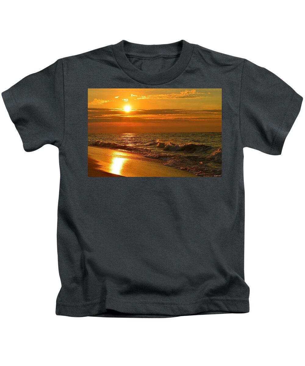 Golden Kids T-Shirt featuring the photograph Golden Sunrise Colors with Waves and Horizon Clouds on Navarre Beach by Jeff at JSJ Photography
