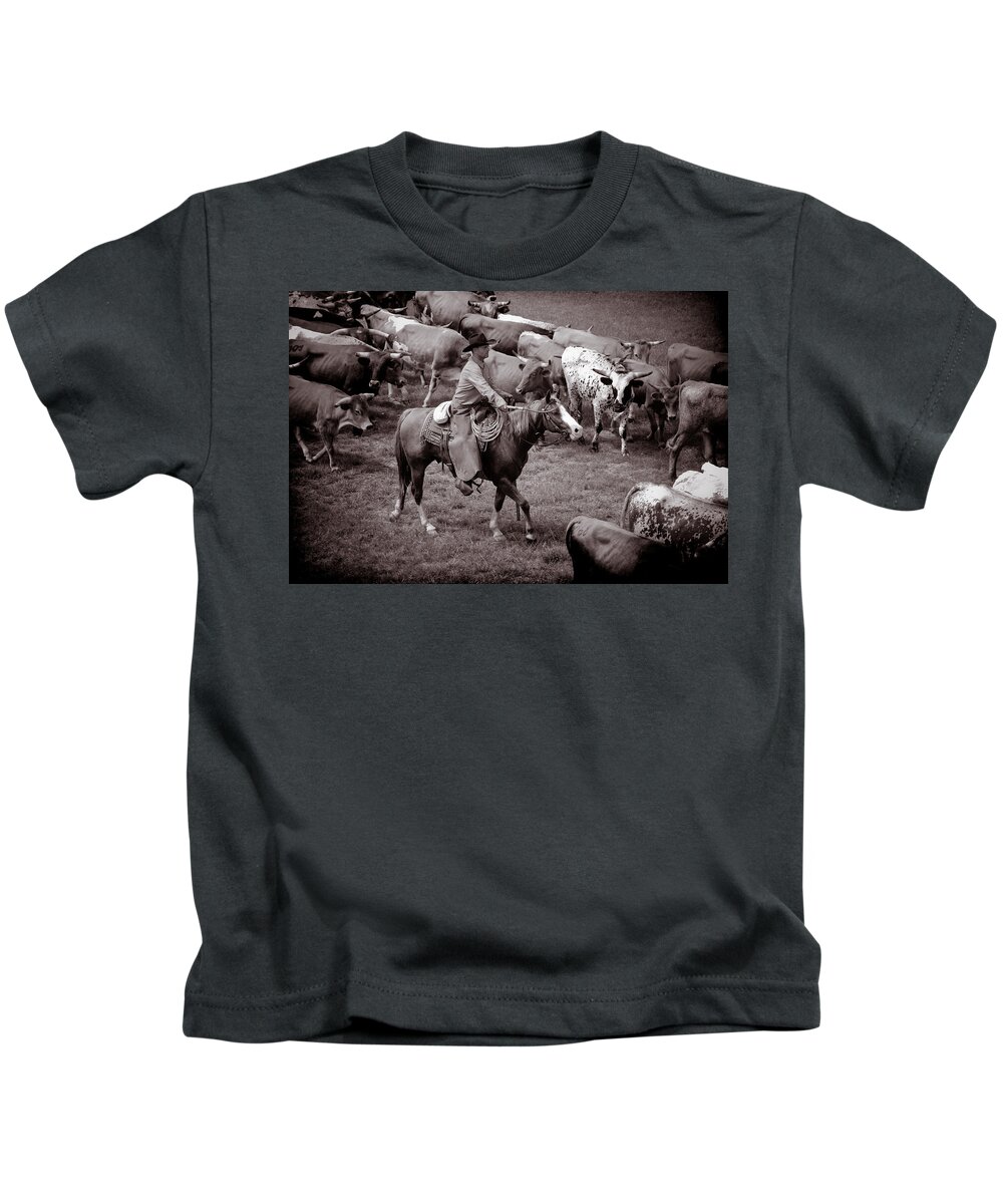 Cowboy Photograph Kids T-Shirt featuring the photograph Keep em moving by Toni Hopper