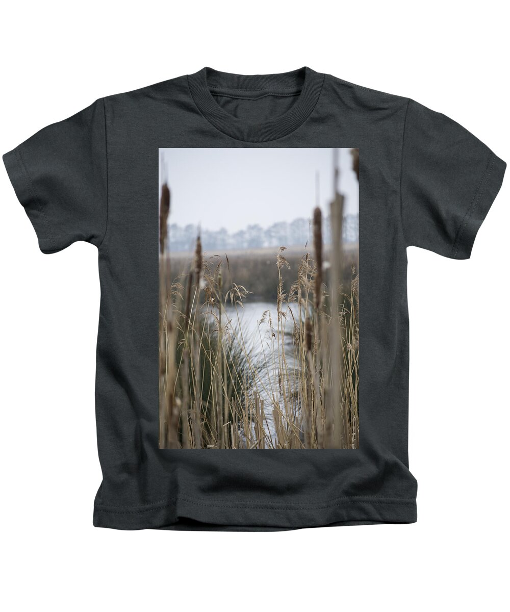 Reeds Kids T-Shirt featuring the photograph Looking through the Reeds by Spikey Mouse Photography