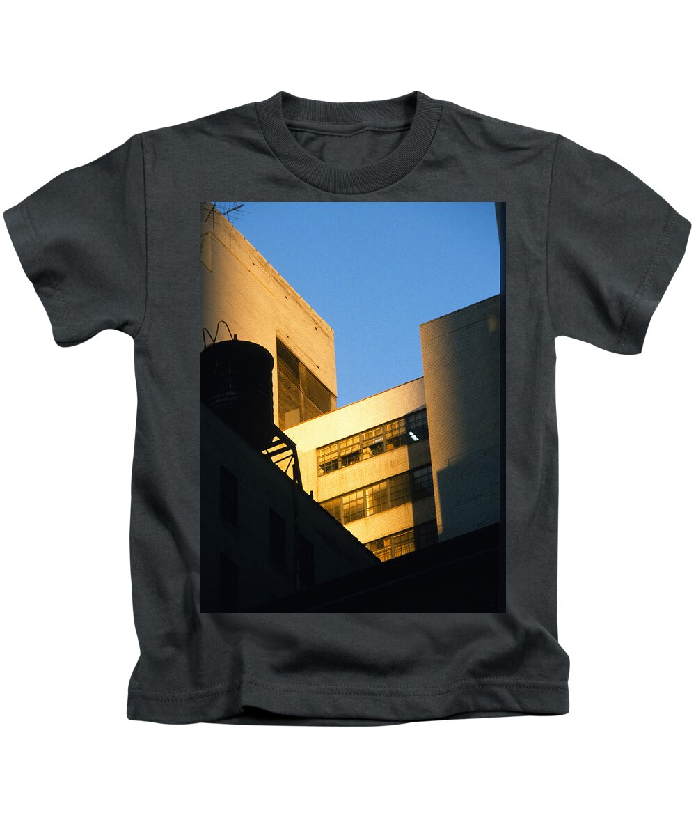 Manhattan Kids T-Shirt featuring the photograph Manhattan Rooftop Sunlight and Shade by Gordon James