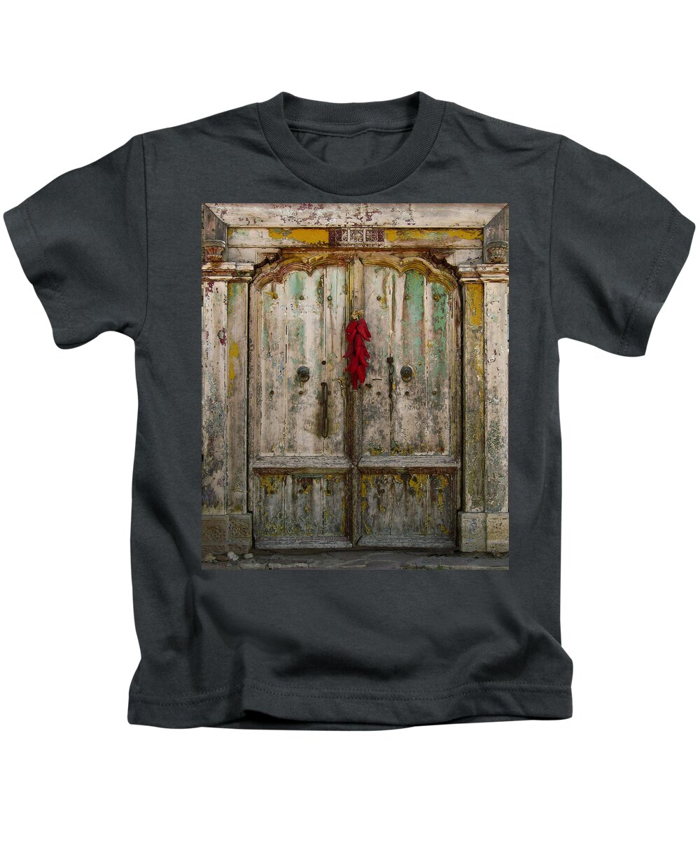 Door Kids T-Shirt featuring the photograph Old Ristra Door by Kurt Van Wagner