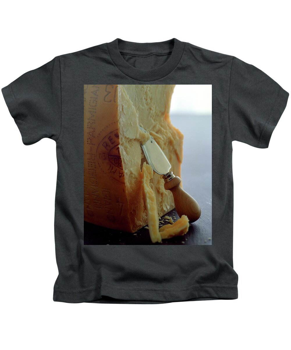 Dairy Kids T-Shirt featuring the photograph Parmigiano-reggiano Cheese by Romulo Yanes