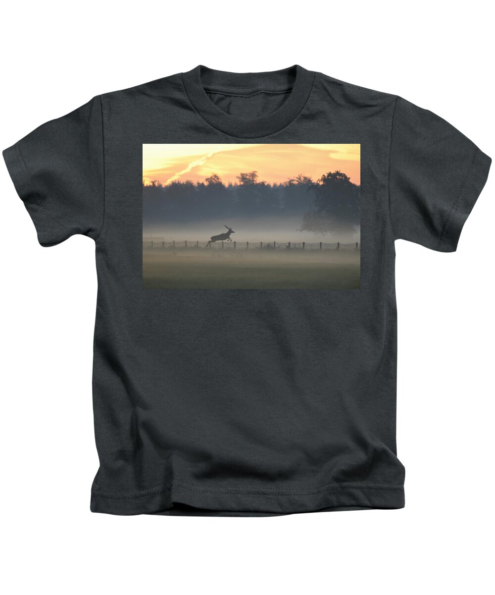 Ton Schenk Kids T-Shirt featuring the photograph Red Deer Stag Jumping Fence by Ton Schenk