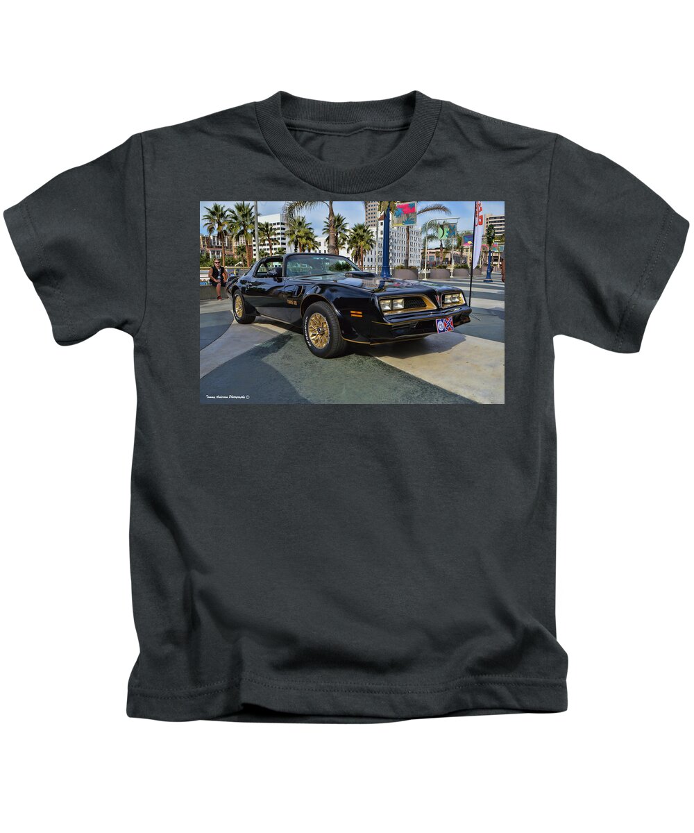 1977 Pontiac Firebird Trans Am Kids T-Shirt featuring the photograph Smokey and the Bandit by Tommy Anderson