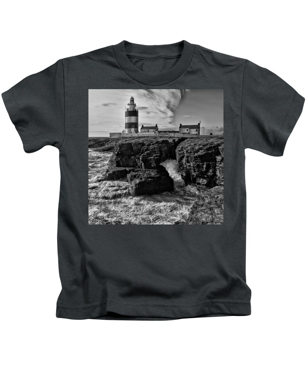 Hook Kids T-Shirt featuring the photograph Stormy day at Hook Head Lighthouse by Nigel R Bell