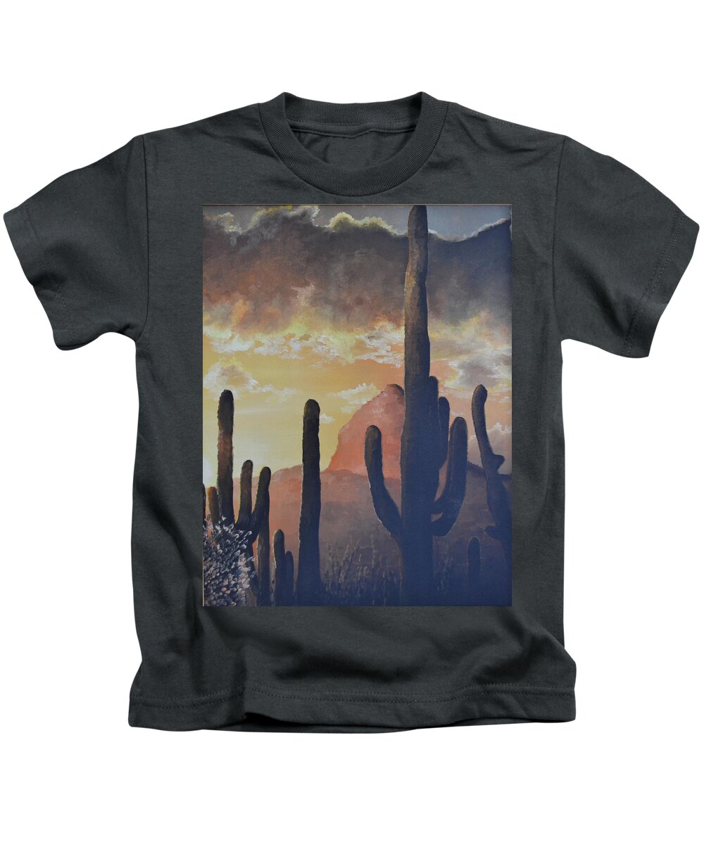 A Sunrise In The Tucson Desert With Cactus Kids T-Shirt featuring the painting Sunrise in Tucson by Martin Schmidt
