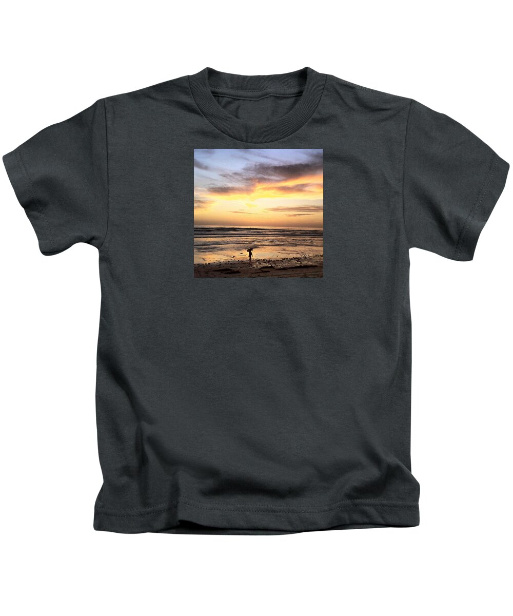 Sunset Surfer Print Framed Prints Kids T-Shirt featuring the photograph Sunset Surfer by Paul Carter