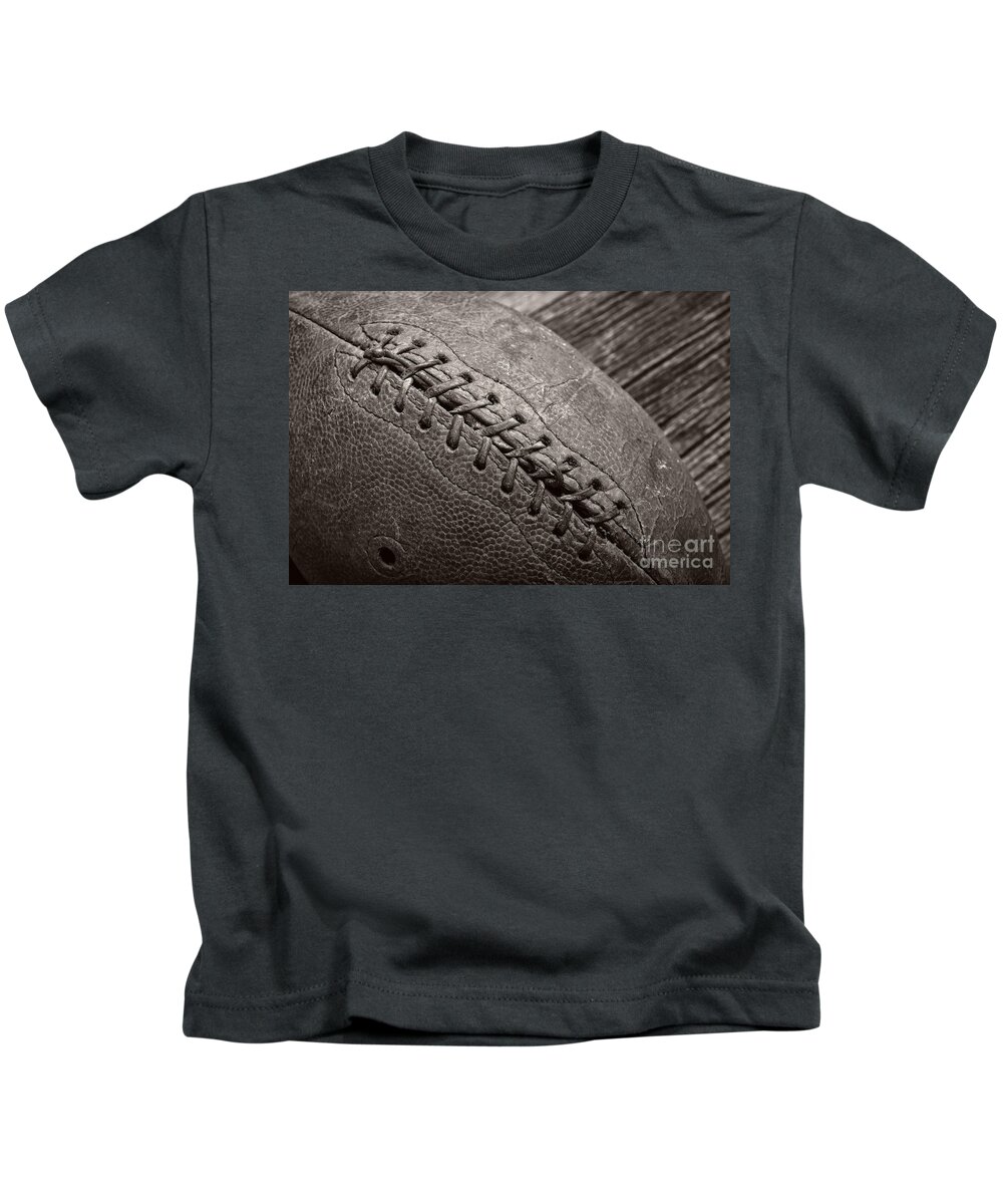 Football Kids T-Shirt featuring the photograph The Old Pigskin by Edward Fielding