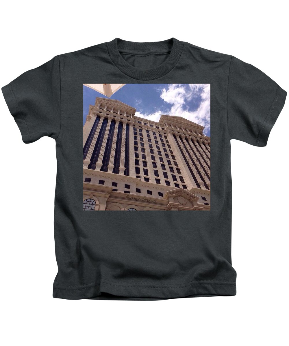 Venuspool Kids T-Shirt featuring the photograph View Of Caesar's Palace And The Blue by Anna Porter