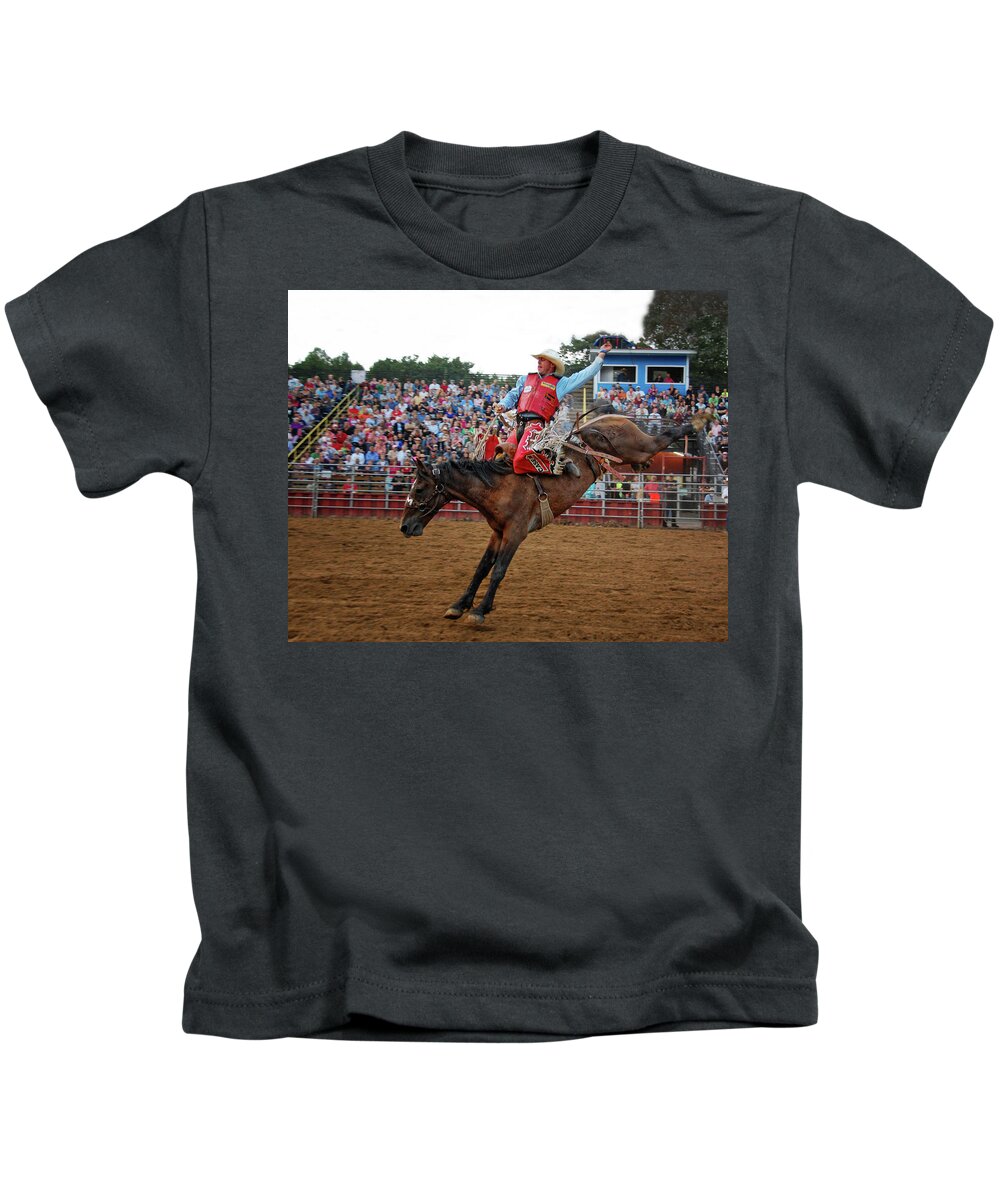 Bucking Horse Kids T-Shirt featuring the photograph Bucking Horse by Peg Runyan