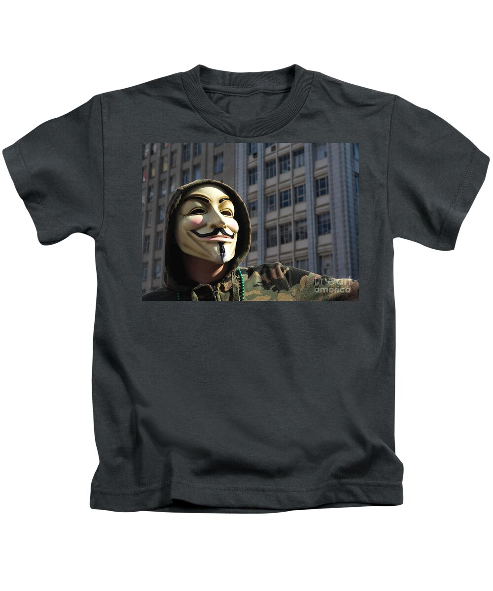Anonymous Kids T-Shirt featuring the photograph Rage Against the Machine by Andrea Kollo