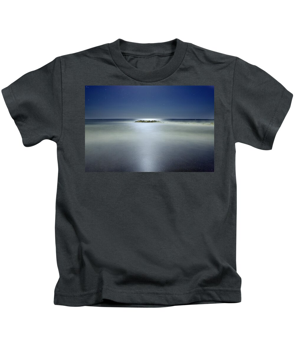 Moonlight Kids T-Shirt featuring the photograph The rock island under de moonlight by Guido Montanes Castillo