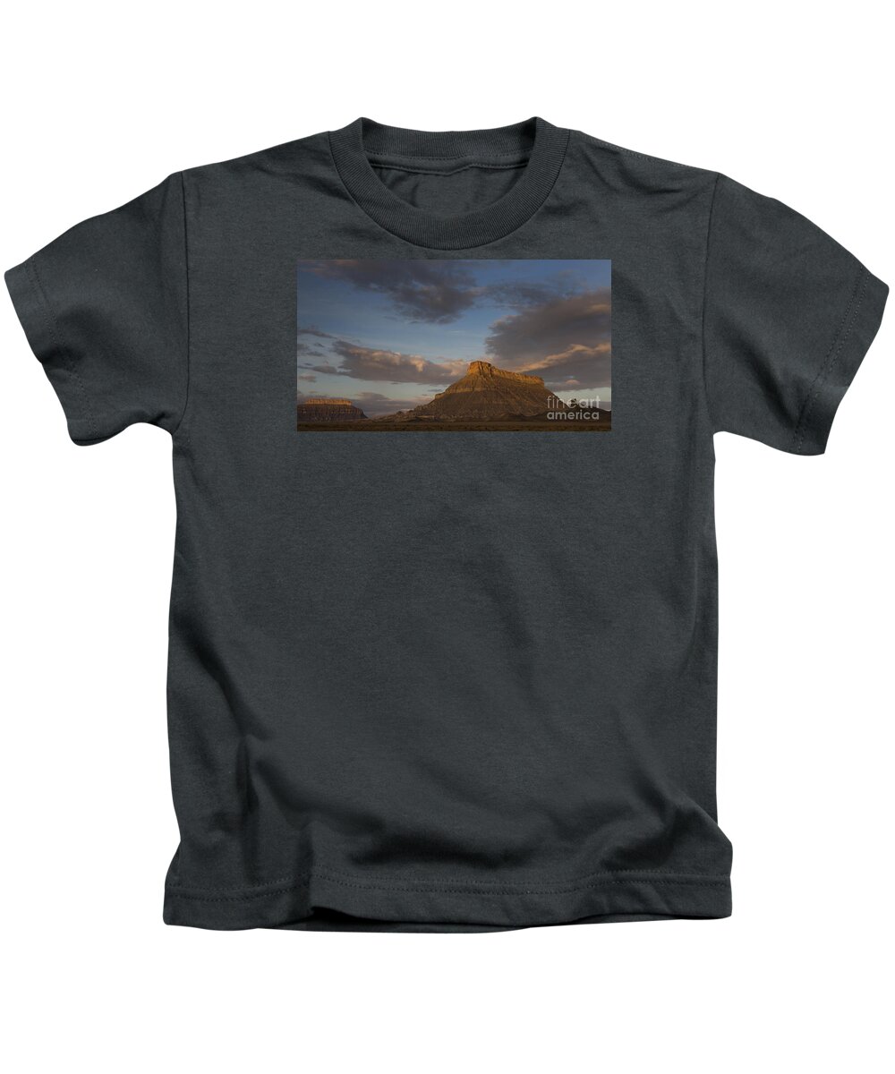 Factory Butte Kids T-Shirt featuring the photograph Sunrise over Factory Butte #1 by Keith Kapple