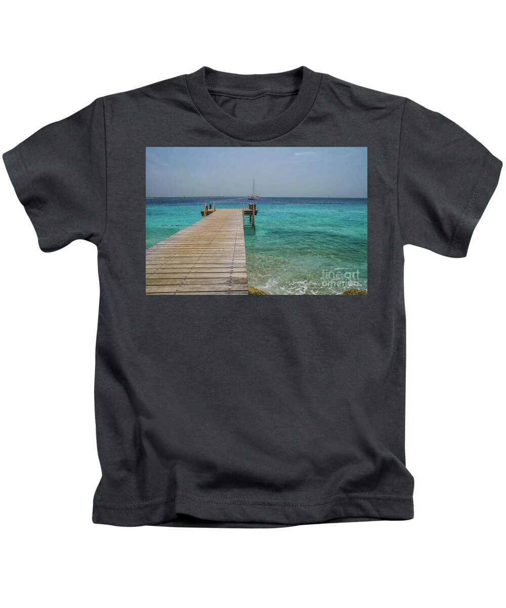 Boat Kids T-Shirt featuring the photograph Wooden jetty in Caribbean ocean by Patricia Hofmeester