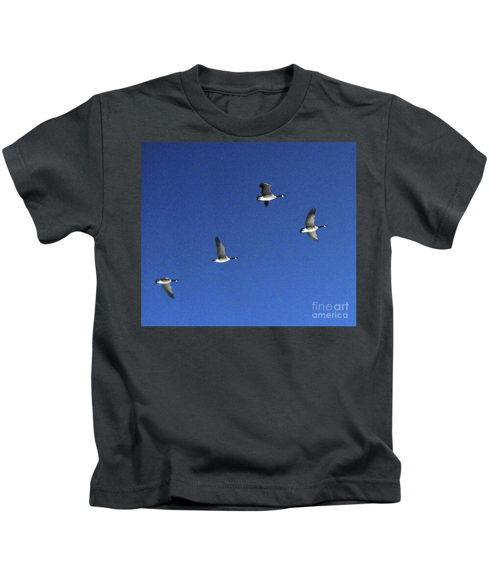 Geese Kids T-Shirt featuring the photograph 4 Geese in Flight by Cindy Schneider