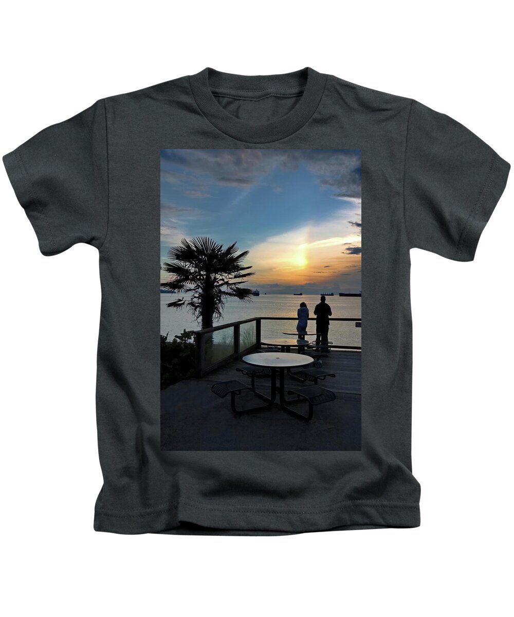 Alex Lyubar Kids T-Shirt featuring the photograph Beautiful sunset on the waterfront. by Alex Lyubar