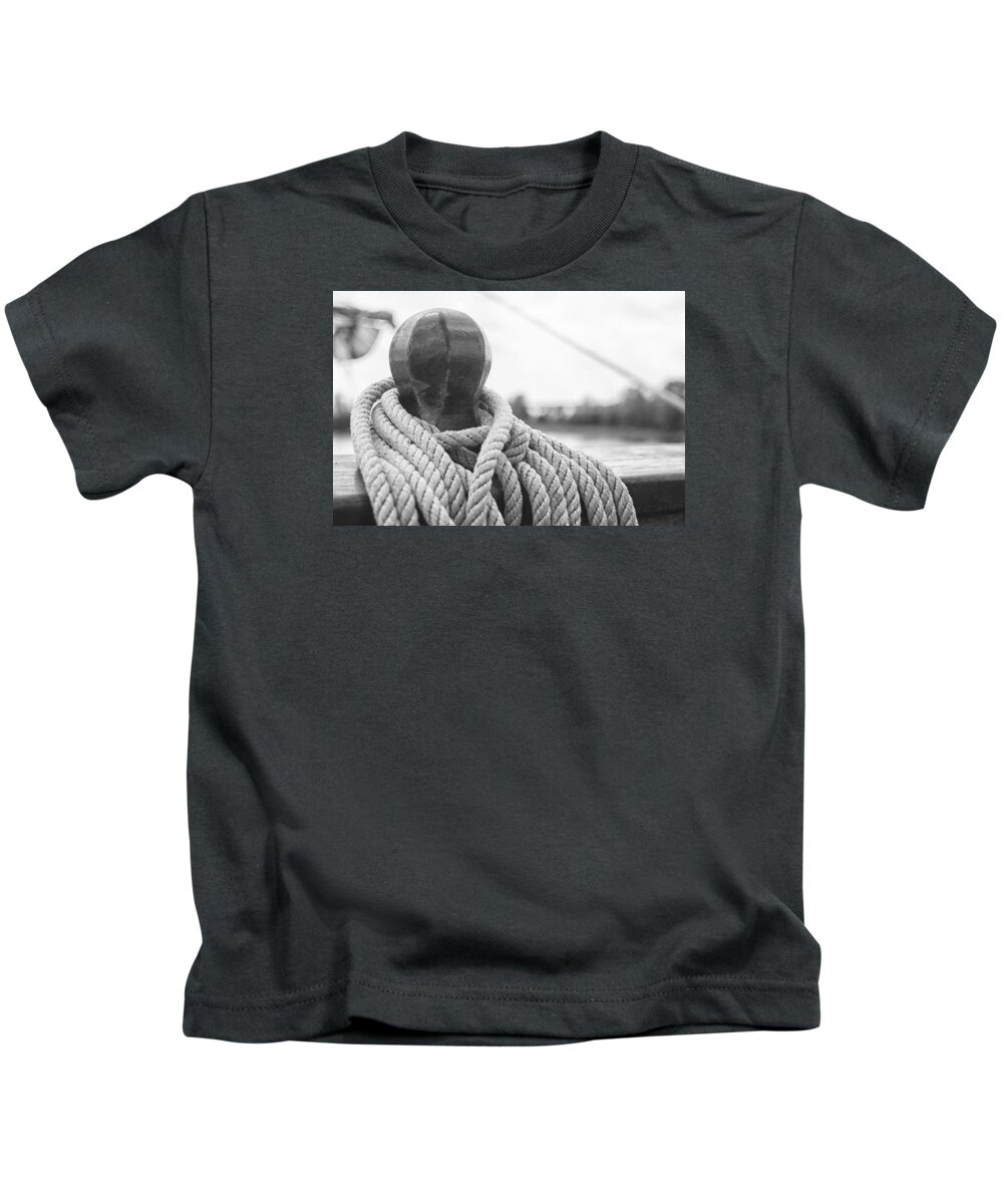 Ship Kids T-Shirt featuring the photograph Beneath the Sail Coiled Rope by Bob Decker