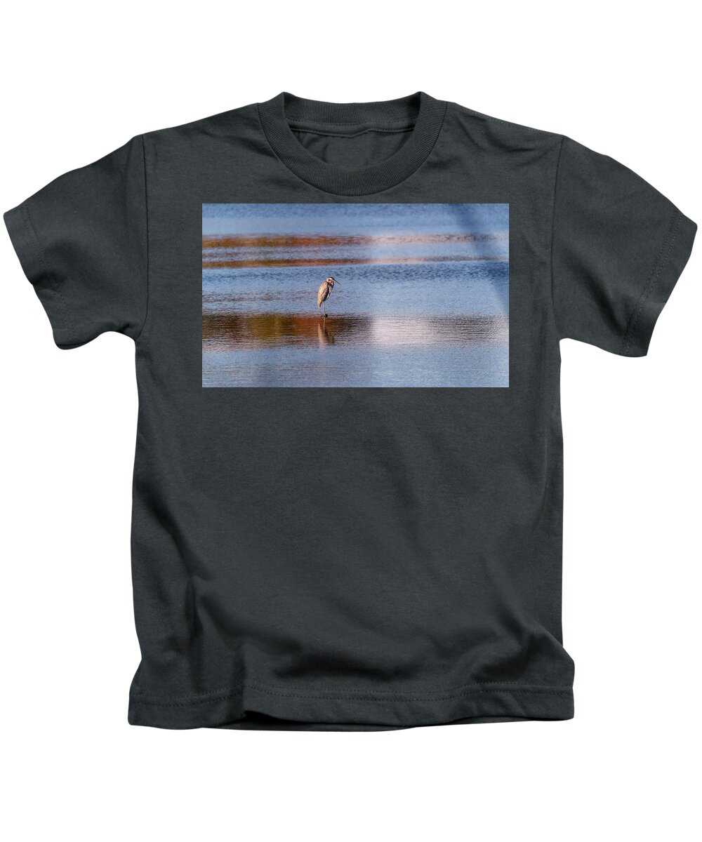 Blue Heron Kids T-Shirt featuring the photograph Blue Heron standing in a pond at sunset by Patrick Wolf
