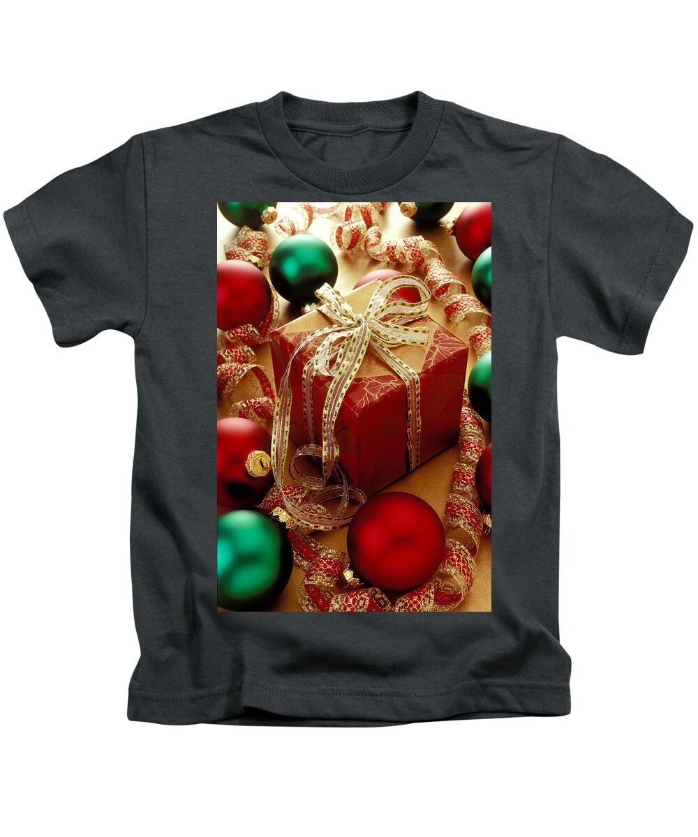 Christmas Kids T-Shirt featuring the photograph Christmas present and ornaments by Garry Gay