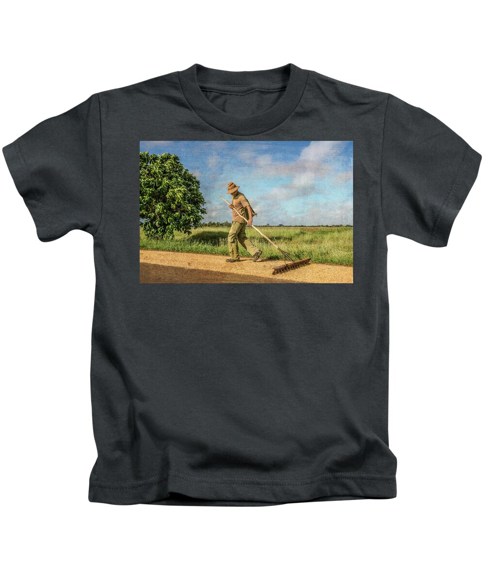 Architectural Photographer Kids T-Shirt featuring the photograph Drying Rice by Lou Novick