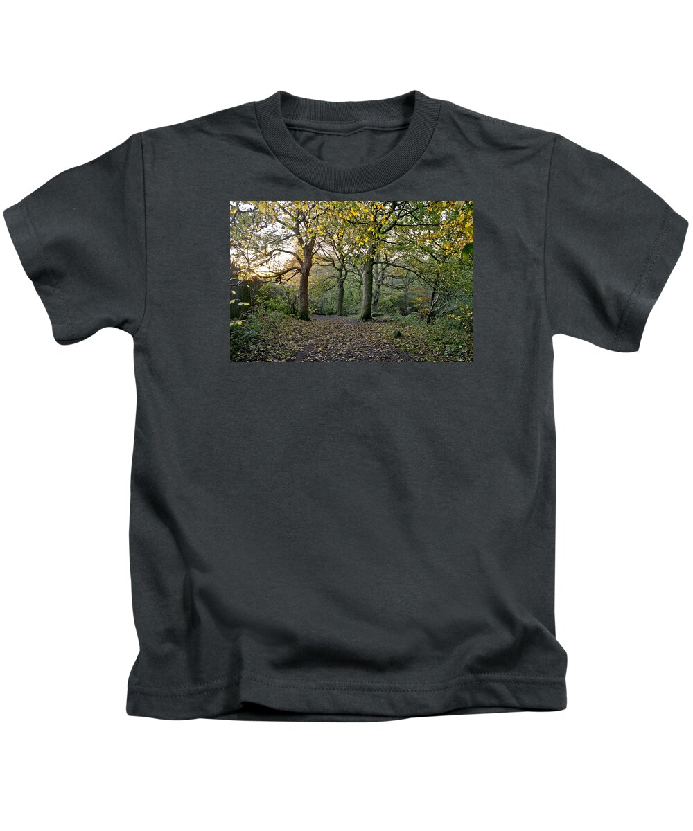 Autumn Kids T-Shirt featuring the photograph Dusk in the autumn woods. by Elena Perelman