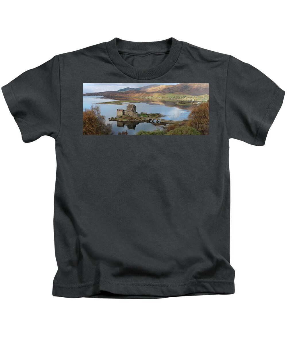 Eilean Donan Castle Kids T-Shirt featuring the photograph Eilean Donan Castle in Autumn - Panorama by Maria Gaellman
