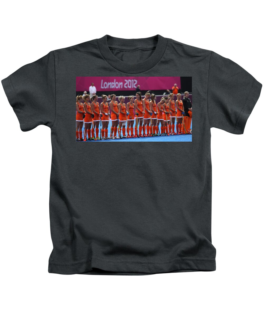 Field Hockey Kids T-Shirt featuring the digital art Field hockey by Super Lovely