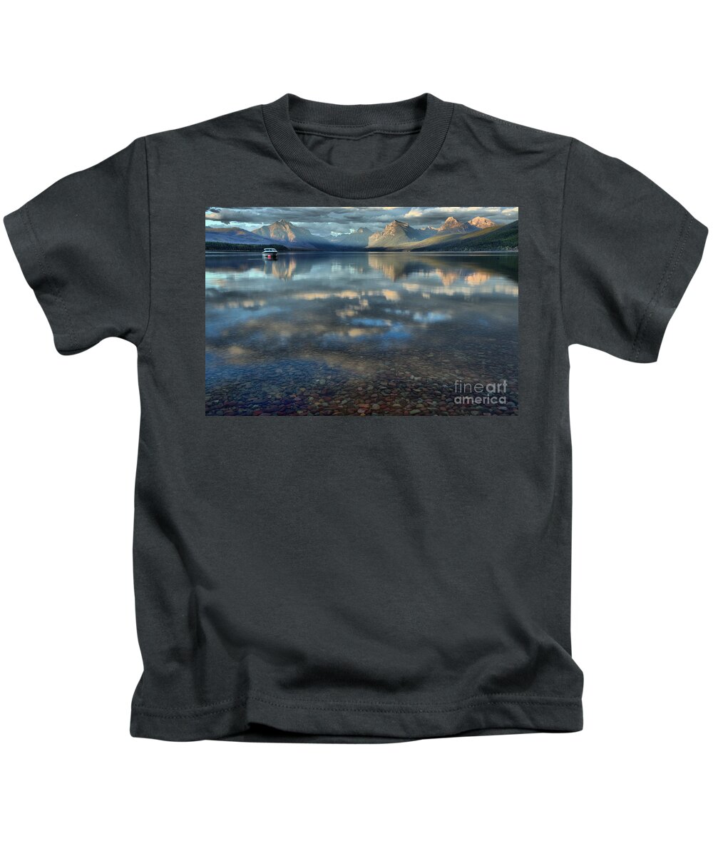 Lake Mcdonald Kids T-Shirt featuring the photograph From Pebbles To Glacier Peaks by Adam Jewell
