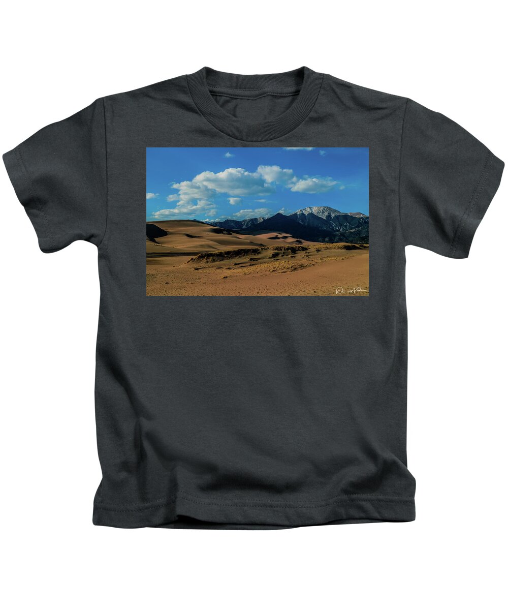 Canon 7d Mark Ii Kids T-Shirt featuring the photograph Herard past the Dunes by Dennis Dempsie